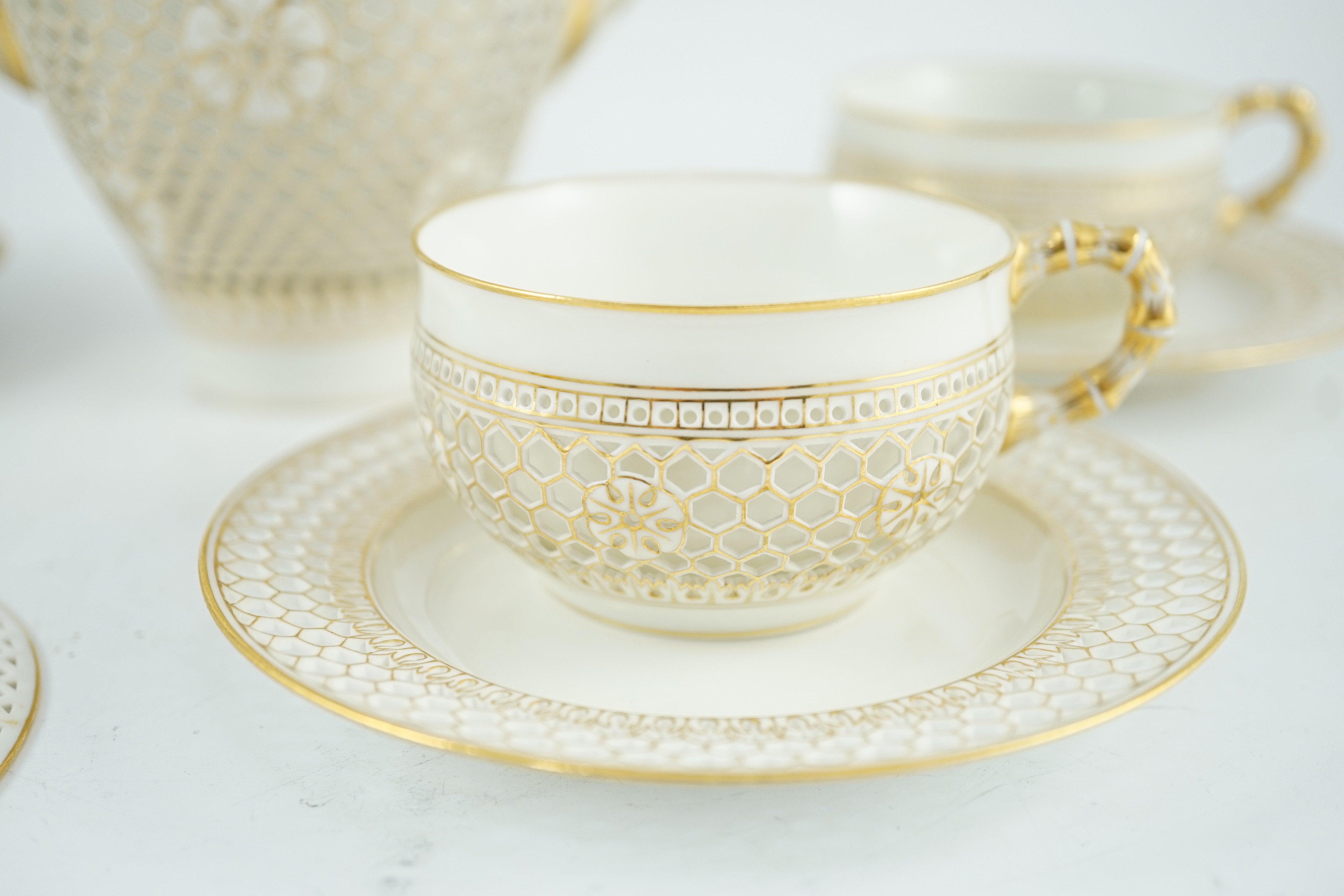 A Sevres reticulated part coffee set, early 20th century, coffee pot 19cm high